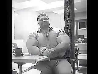Massive Biceps in tight Shirt